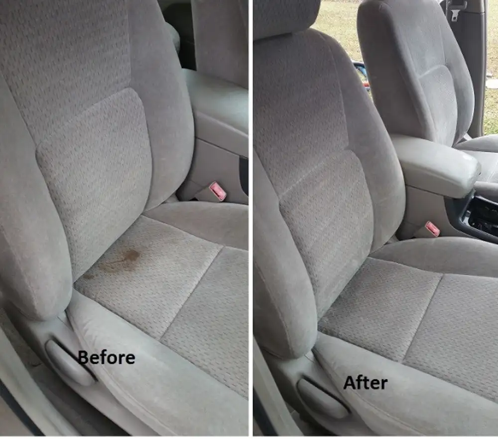 Car interior seat being steam cleaned